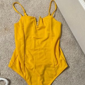 Urban planet yellow body suit